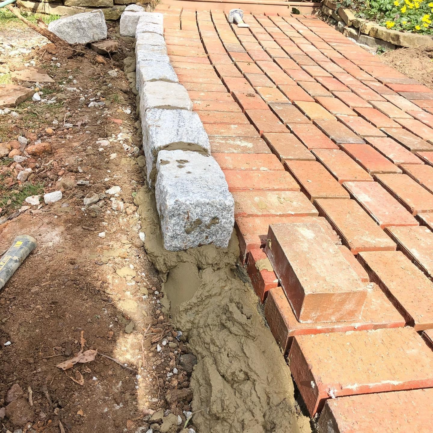 Granite curb and brick patio edging