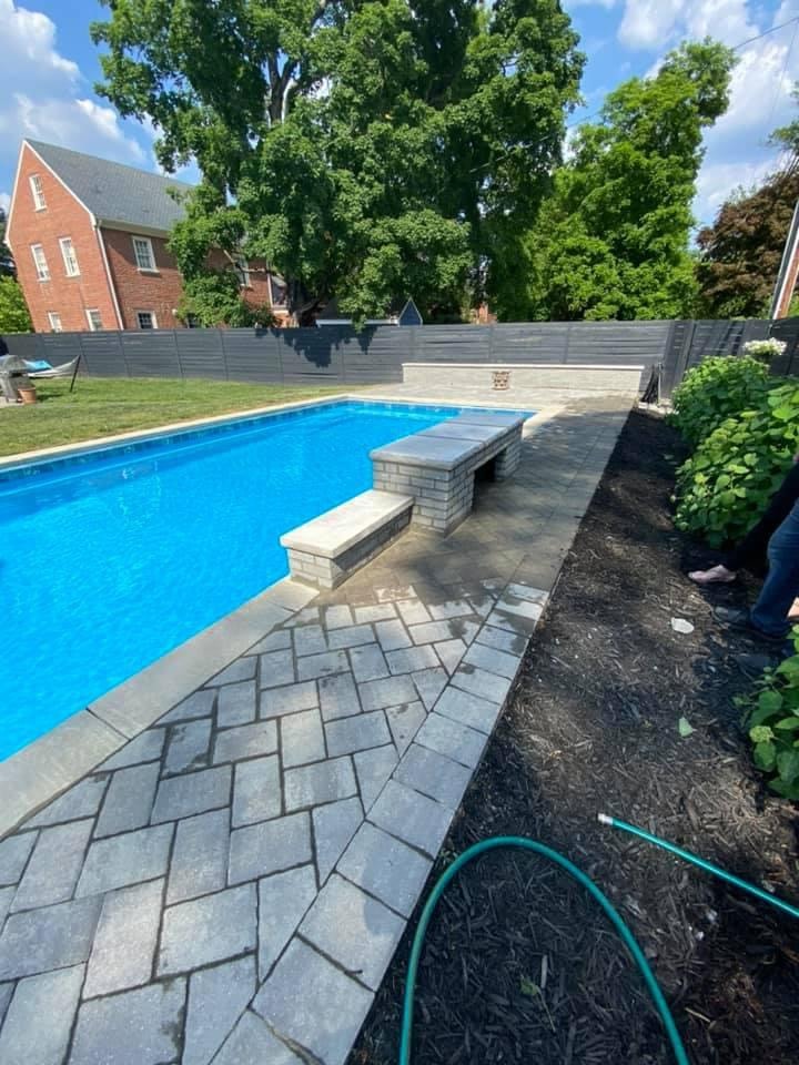 Completed pool patio with stone pavers